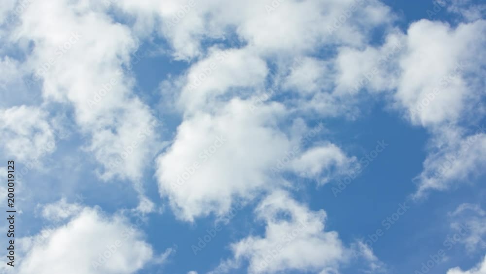 Beautiful cirrus clouds moving across a summer blue sky. It can also be used as a transitional video, a meditative video, or for nature-related projects.