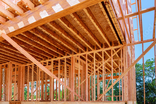 Wood frame of house under beam construction