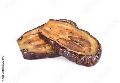 grilled purple eggplant with black pepper on white background