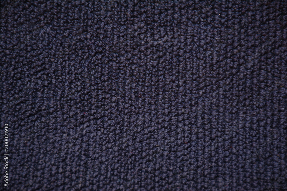 Blue naval color towel, close up. textile, texture, isolated. Blue naval color towel, close up. textile, texture, isolated.