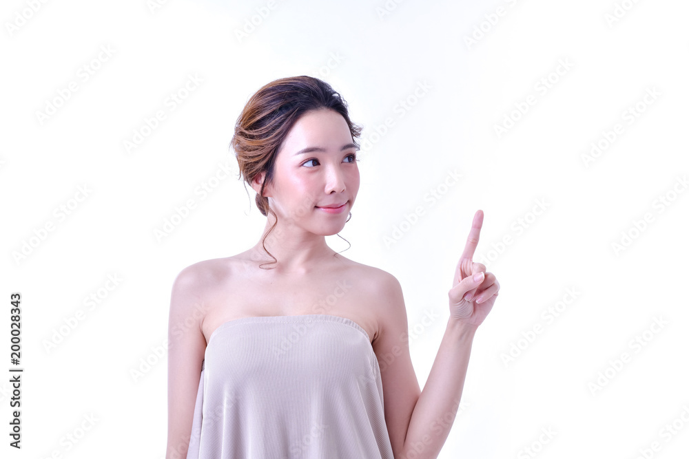 The concept of healthy beautiful woman. Beautiful women keep healthy. Beautiful women are present. Beautiful woman pointing fingers on white background. The concept of healthy beautiful woman. Beautiful women keep healthy. Beautiful women are present. Beautiful woman pointing fingers on white background.