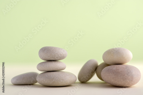 Harmony and balance stack of smooth white pebbles on light background