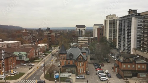 Pan of Hamilton city's  architecture, apartment buildings, busy streets cathedrals and government buildings. photo