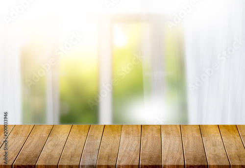 morning bright curtain window and empty table  blurred background can be used for display or montage your products and Mock up