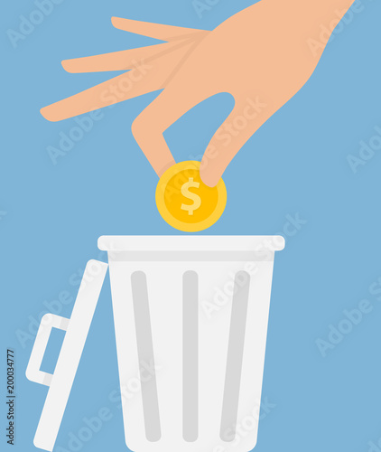 Hand putting golden coin with dollar symbol on it into a trash bin