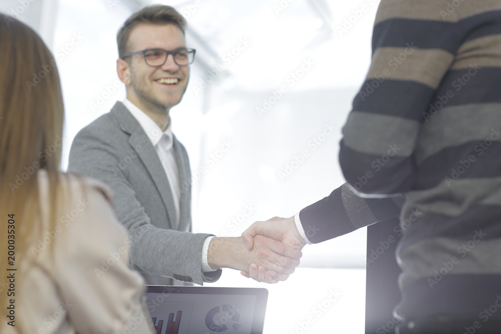 close up. handshake business partners in a modern office close up. handshake business partners in a modern office