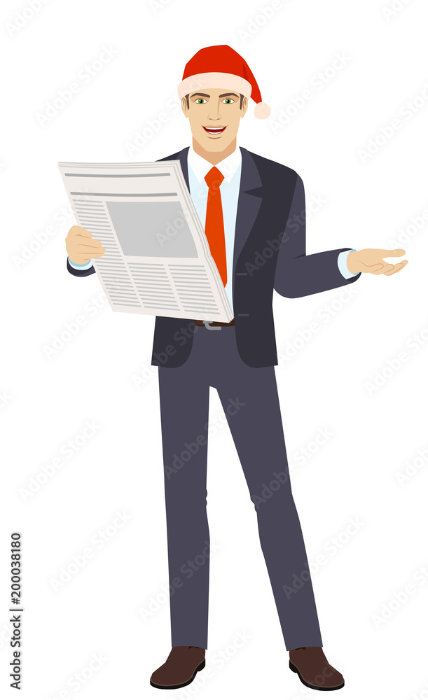 Businessman in Santa hat with newspaper gesturing Businessman in Santa hat with newspaper gesturing