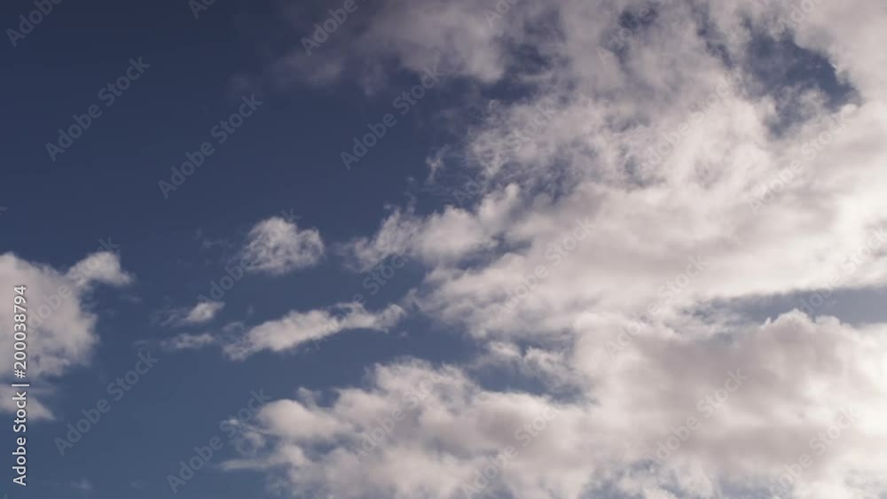 Clouds float by on a sunny day. Clouds float by on a sunny day.