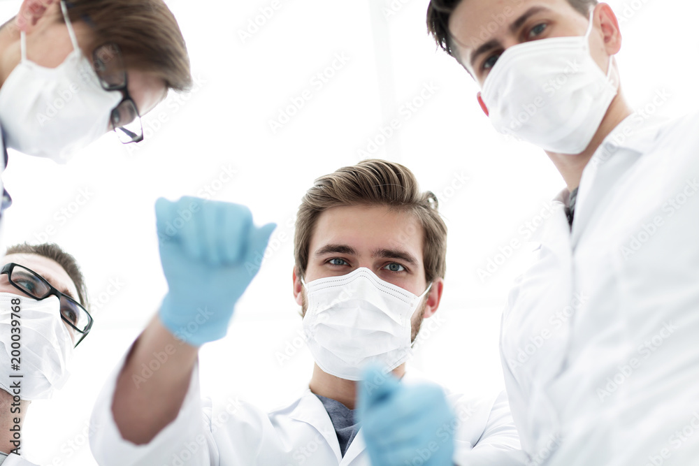 Team surgeon at work in operating room. Team surgeon at work in operating room.