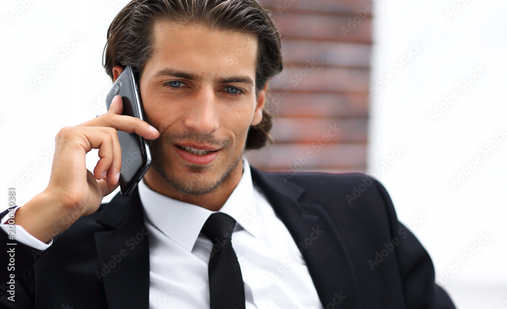 business man talking on smart phone.