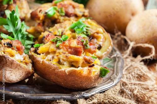 Baked potatoes stuffed with bacon, mushrooms and cheese