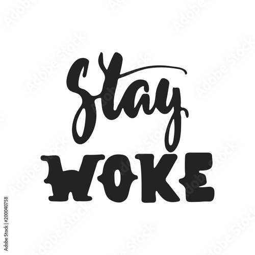 Stay woke - hand drawn lettering phrase isolated on the black background. Fun brush ink vector illustration for banners, greeting card, poster design.
