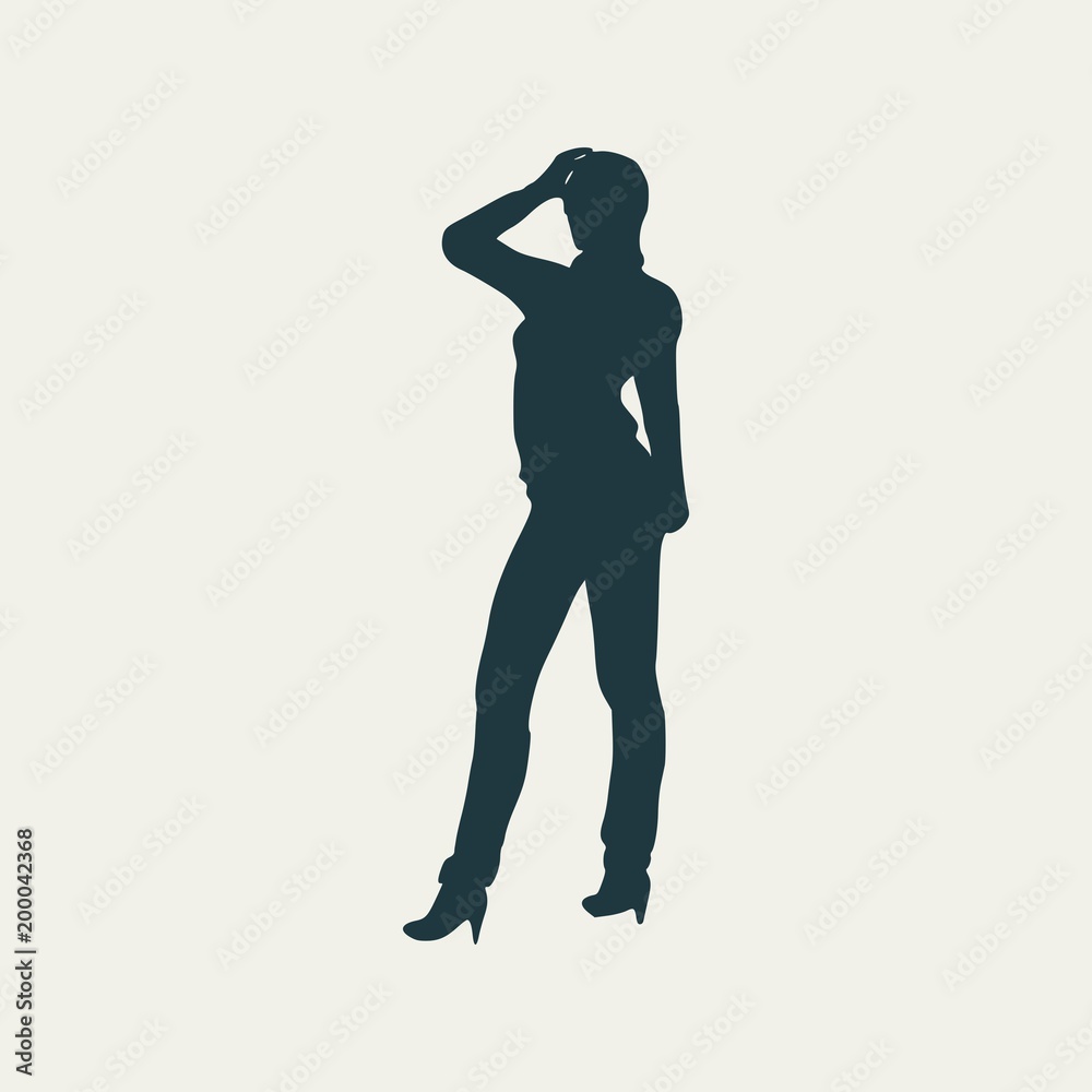Silhouette of business woman wearing the suit.