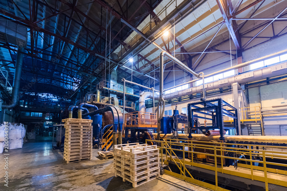 Fiberglass production industry equipment at manufacture background Fiberglass production industry equipment at manufacture background