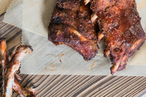 Grilled pork baby ribs with barbecue sauce - bird view