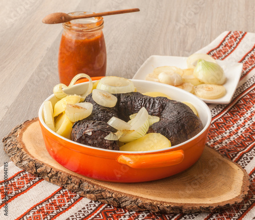 Lunch with ring pudding sausages and potatoes photo