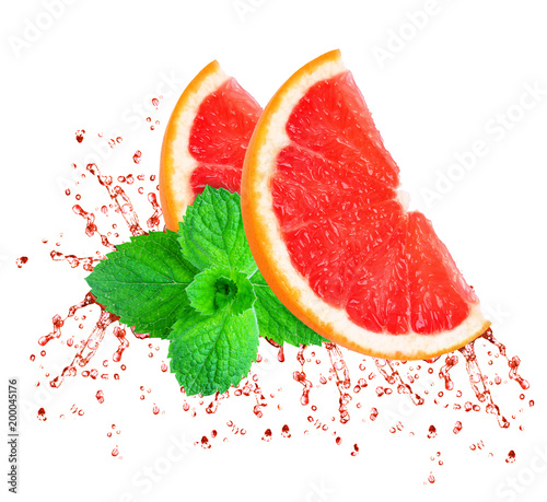 grapefruit splashing juice isolated on white