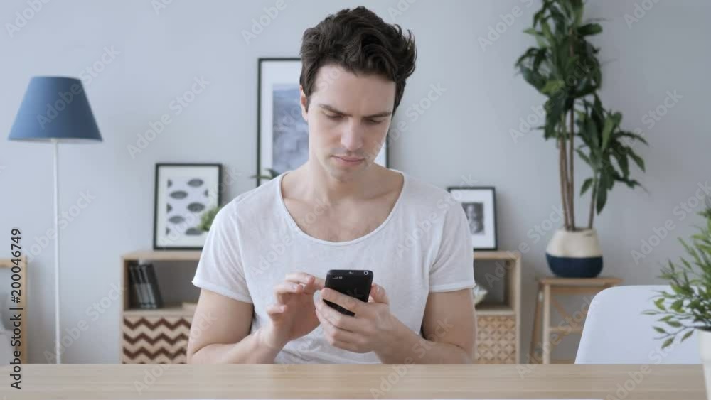 Man Using Smartphone, Browsing online Internet Man Using Smartphone, Browsing online Internet