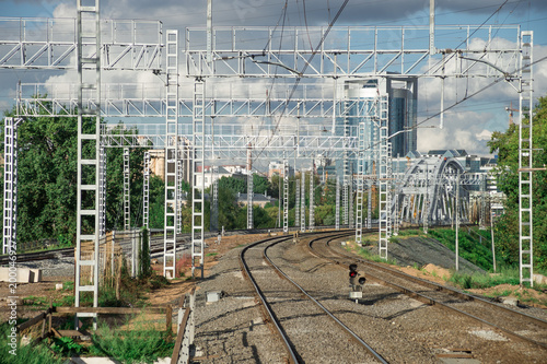 Railroad, rail tracks, railways and power supply lines - travel concept