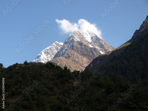 Mountain getting kissed from warm sunlight.