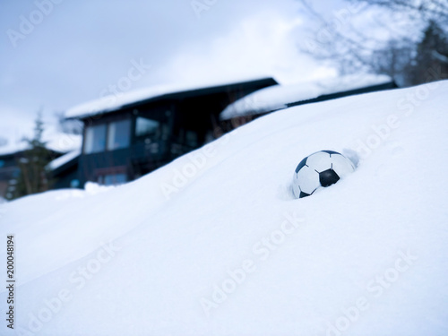 Football in snow photo