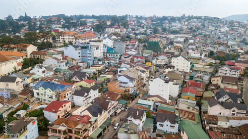 Aerial view from the drone to Dalat city roofs and roads.Located on the Langbian Plateau in the southern parts of the Central Highlands region of Vietnam