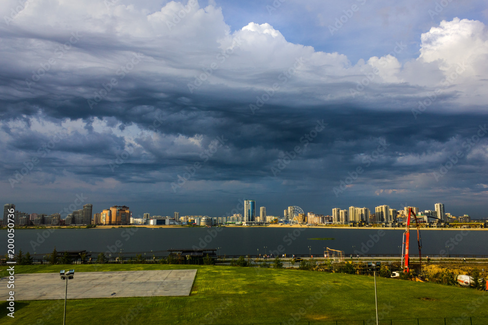 Storm clouds on a summer day over the city waterfront in Kazan