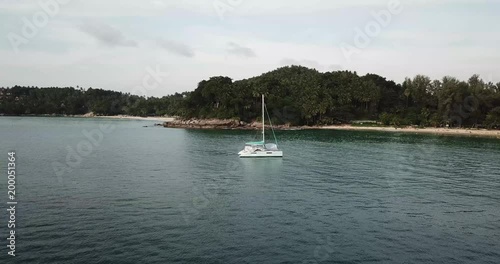 Flying over the white yacht