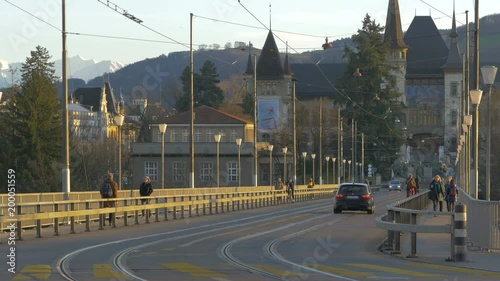 Cars and people on Kirchenfeldbrucke bridge photo