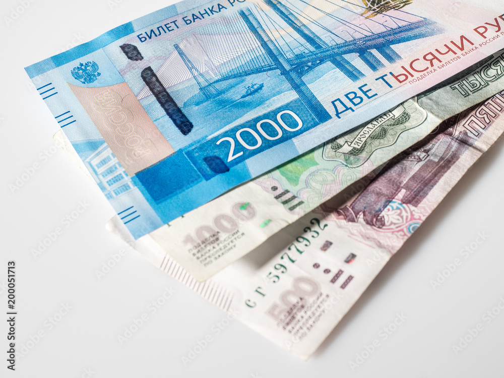 Banknote of two thousand rubles and old banknotes Russian Federation. 2000 rub. Papermoney, cash. Banknote of two thousand rubles and old banknotes Russian Federation. 2000 rub. Papermoney, cash.