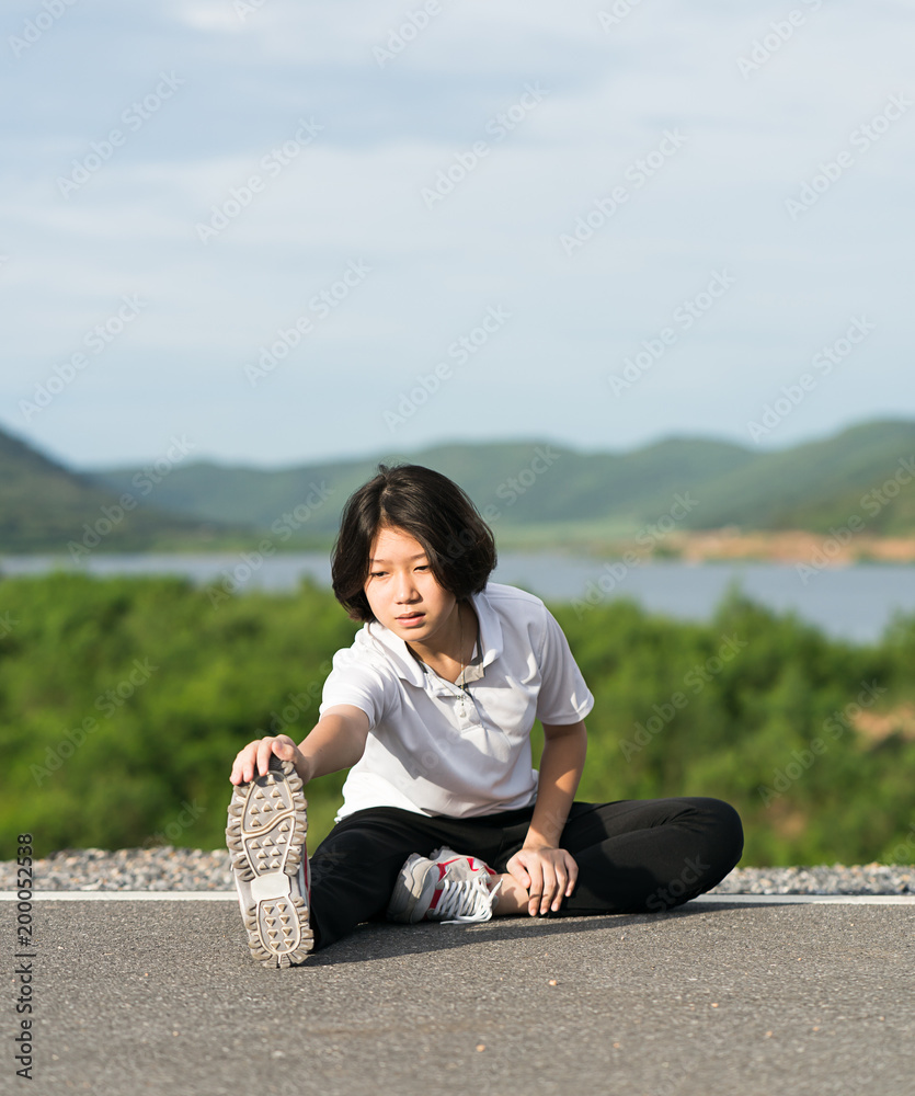 Woman preparing for jogging outdoor