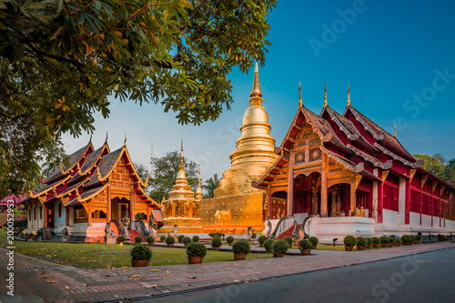 Stunning Wat Phra Singh Woramahawihan Buddhist Temple at sunrise in Chiang Mai, Thailand photo