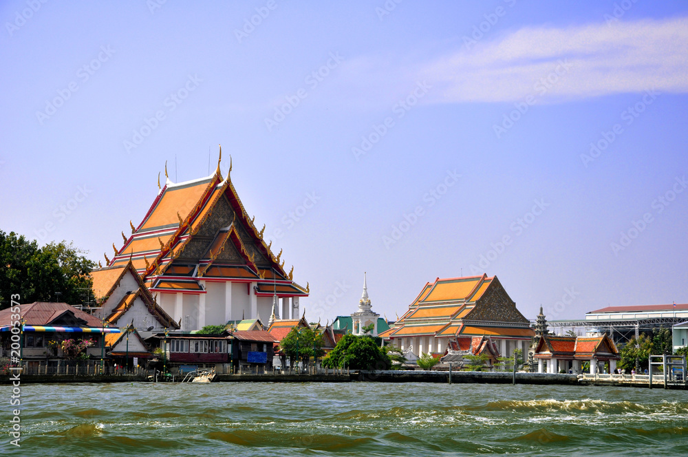 Magnificent Temple of Dawn, on the Banks of the River Chao Phraya Magnificent Temple of Dawn, on the Banks of the River Chao Phraya