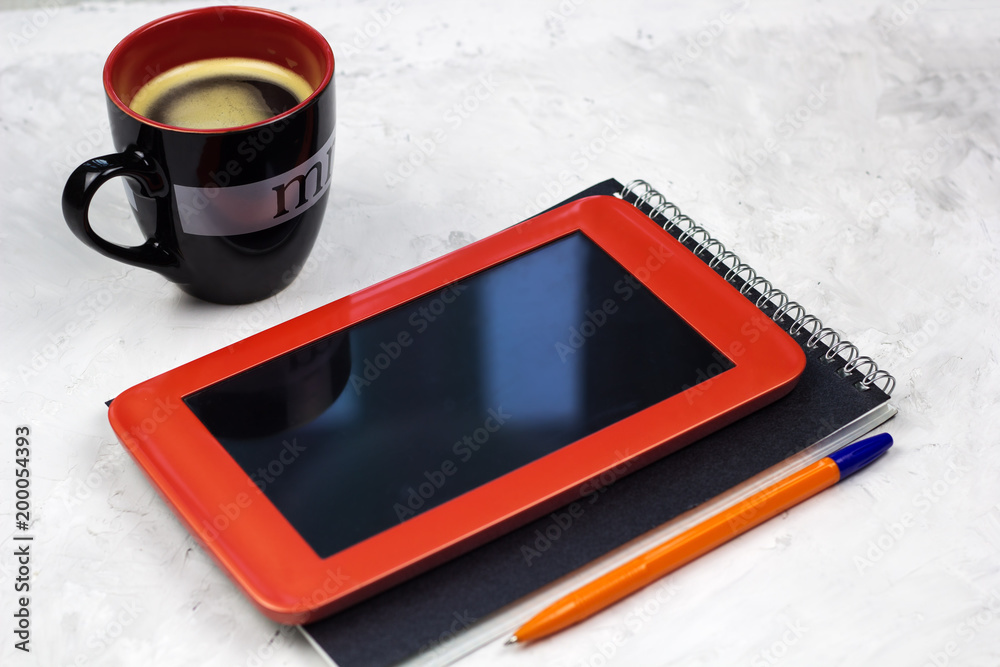 tablet,notebook,pen and coffee cup tablet,notebook,pen and coffee cup