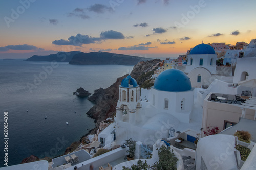 The view of epic village of Oia and the famous blue and white churches at Santorini