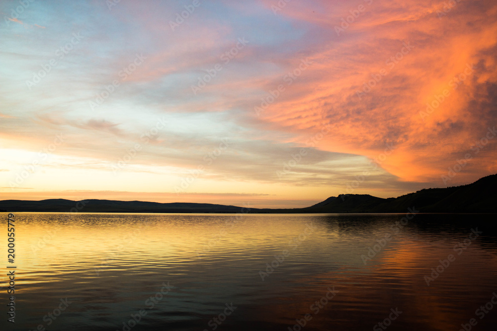  Colorful sunset over the sea surface.