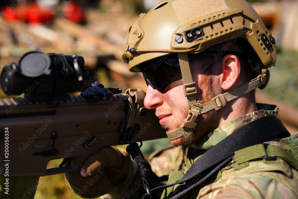 Airsoft player, soldier with weapon Airsoft player, soldier with weapon