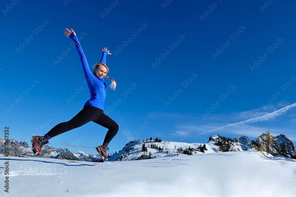 Jumping with joy. Young pretty girl jumping in mountains. Crater Lake. Oregon. United States. Jumping with joy. Young pretty girl jumping in mountains. Crater Lake. Oregon. United States.