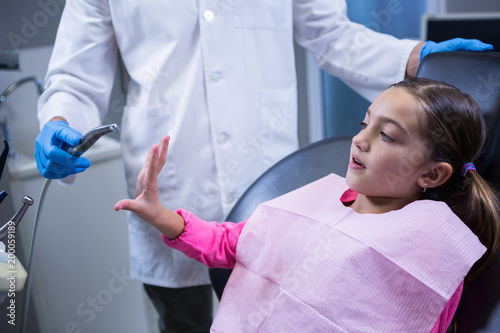Young patient scared during a dental check-up
