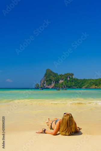 woman resting at the tropical beach of Phi Phi Don © Netfalls