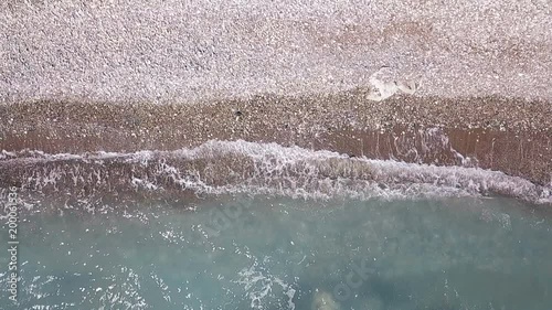 Aerial drone footage shot of huge ocean waves.
