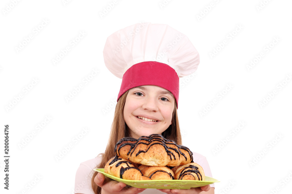 happy little girl cook and tasty croissant with chocolate happy little girl cook and tasty croissant with chocolate