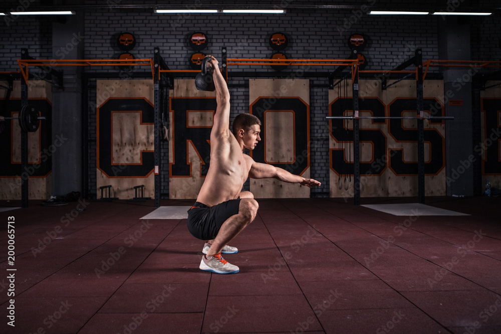 Fitness Kettlebells swing exercise man workout