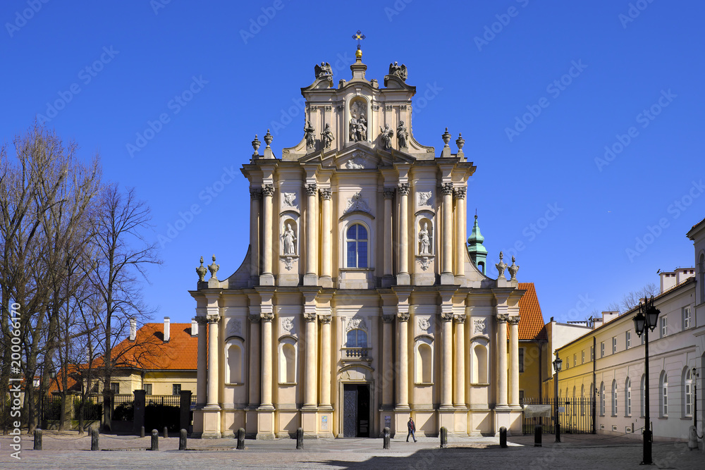 Fototapeta premium Warsaw, Poland - Historic quarter of Warsaw old town - Visitationist Church of St. Joseph at Krakowskie Przedmiescie street