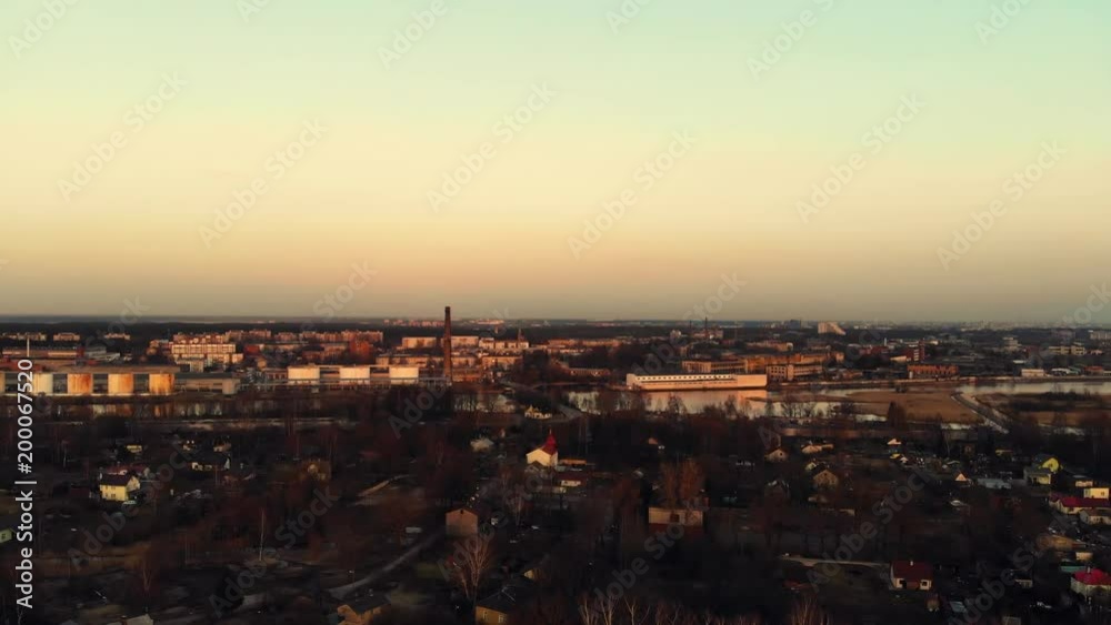 Aerial view over residential area next to the port and industrial area. Drone footage Aerial view over residential area next to the port and industrial area. Drone footage