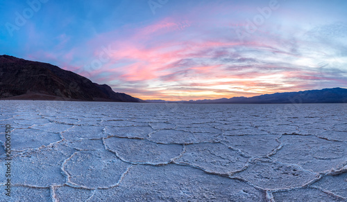 Fiery sunset over Badwater at Death Valley National Park, California