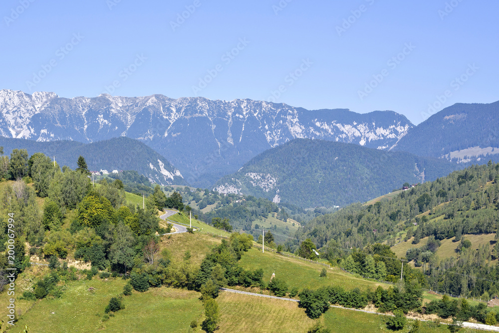 Daylight picturesque sunny view to landscape with green mountains