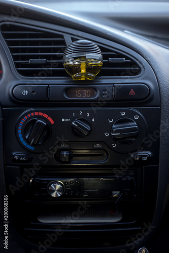 Air conditioning button inside a car. Climate control AC unit in the new car. Modern car interior details