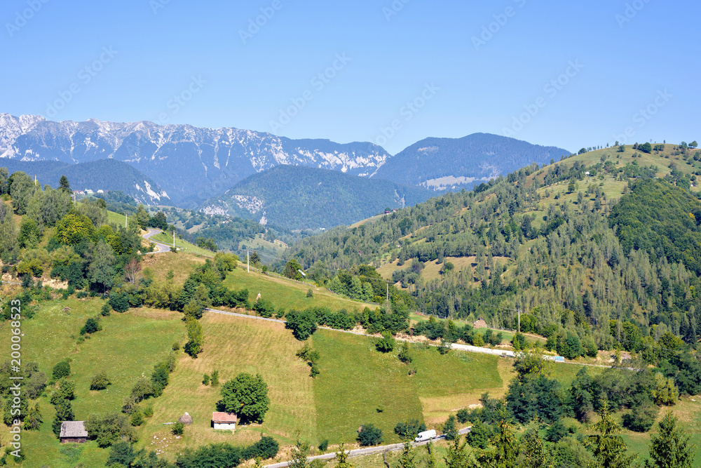 Daylight picturesque sunny view to landscape with green mountains