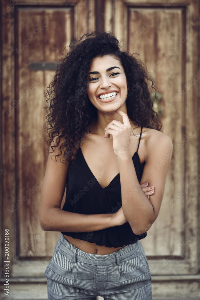 Portrait of young woman with curly hair Portrait of young woman with curly hair
